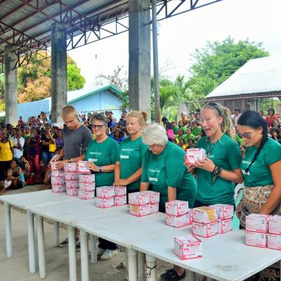 Medical volunteers hand out larvicide to prevent mosquitoes from breeding in the Philippines. Medical volunteers hand out larvicide to prevent mosquitoes from breeding in the Philippines.